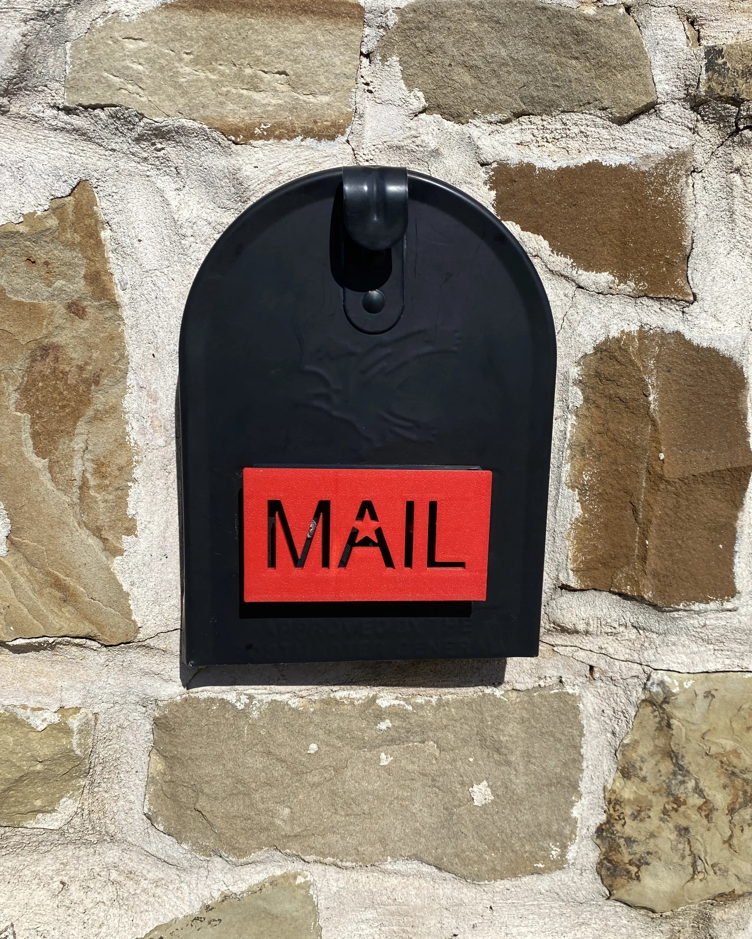 Front mount Mailbox flag with the word Mail mounted on mailbox