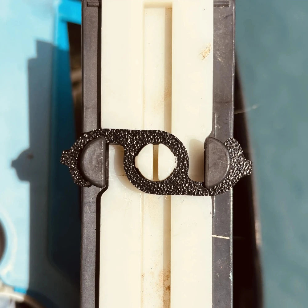 Close-up of a closed filter clip for dolphin pool cleaner