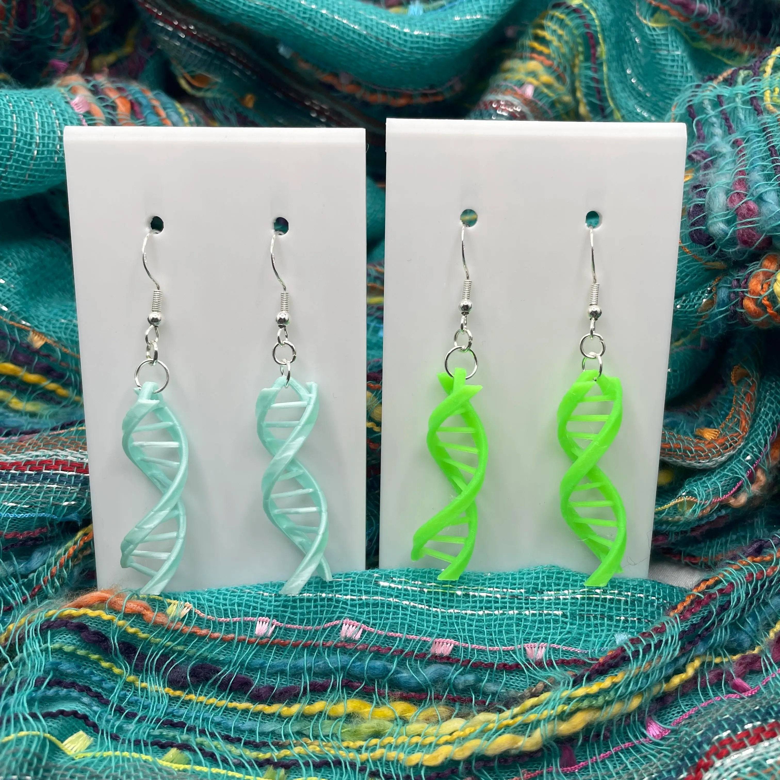 Double Helix DNA Dangle Earrings bring a fun flair to your style.
